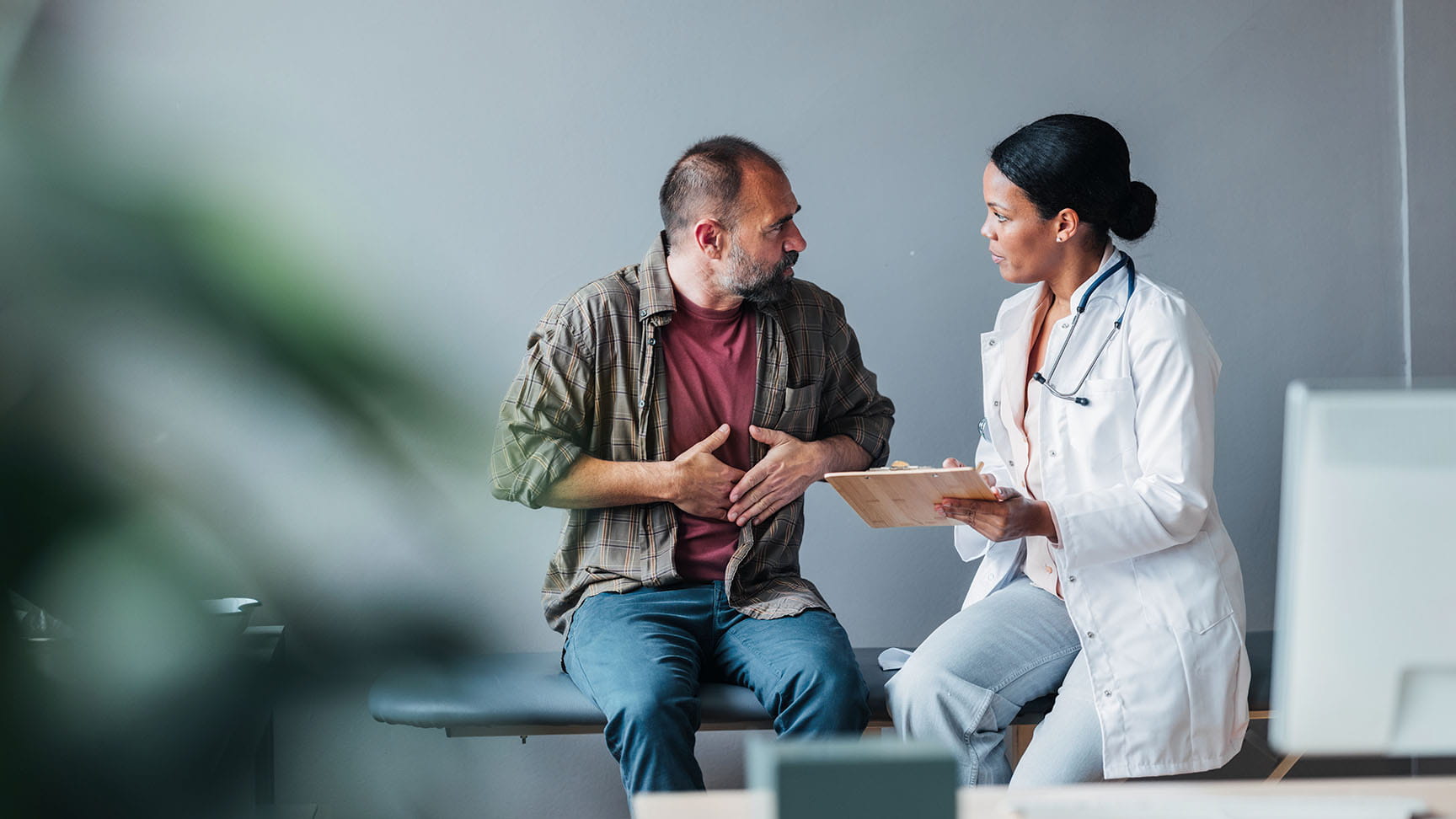 A patient in consultation with a doctor.
