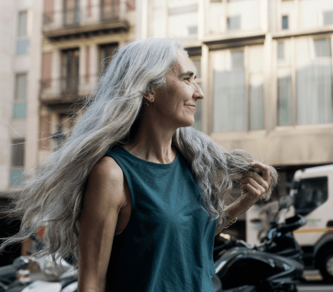 A woman walking down a city street